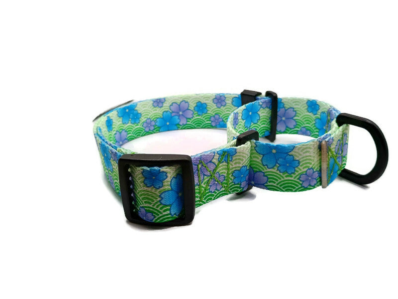 A metal free TSA friendly martingale collar featuring all plastic hardware with beautiful blue and purple blossoms on a spring green background. Designed for dogs with metal allergies and services dogs thru TSA checkpoints.