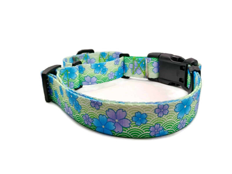 This image displays a beautiful Blue Blossom print on a spring green background. Unlike our typical metal free TSA martingales, this collar features a quick release buckle in a martingale style for easy on and off! Take the hassle out of adjusting to put it over the head and then fitting to the pups neck. Simply unclip this collar, adjust to size and snap it on! No more adjusting for on and off.