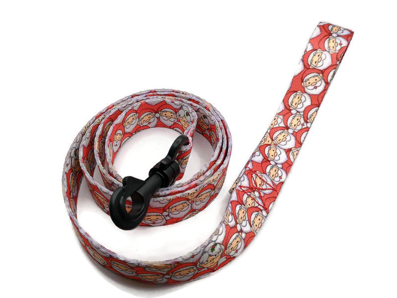 This festive leash features Santa with Mrs Claus hiding inbetween the Santa's on a red background. Featuring 2 leash clip styles; swivel clips or bolt snaps! Completely metal free, ideal for dogs with metal allergies or TSA checkpoints.