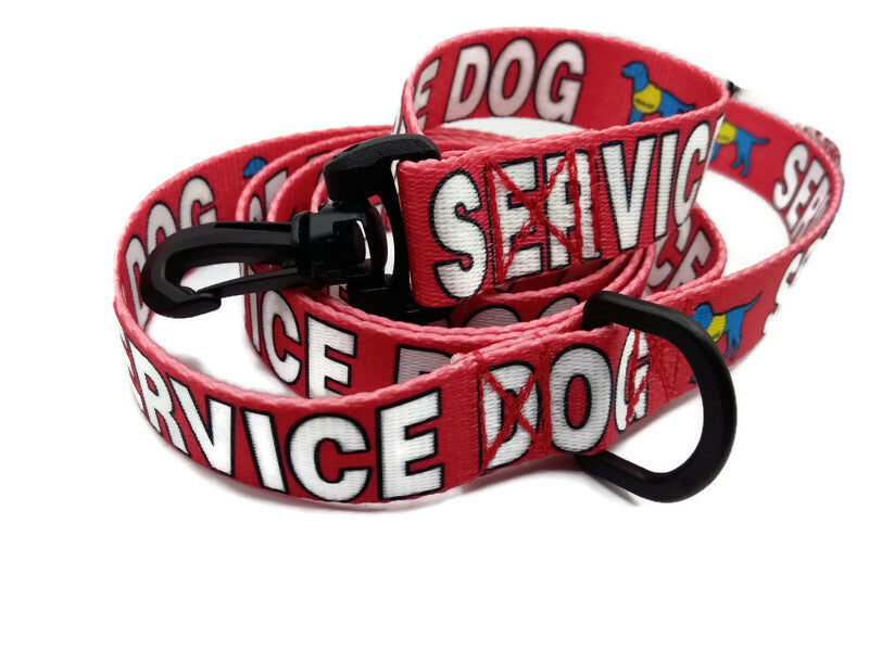 A medium red; similar to a tomato red color. This leash offers two leash clip styles to the owners preference, with the words "SERVICE DOG" to help bypassers know your pup is a working dog and to be left alone! Completely metal free, great for dogs with metal allergies or TSA checkpoints.